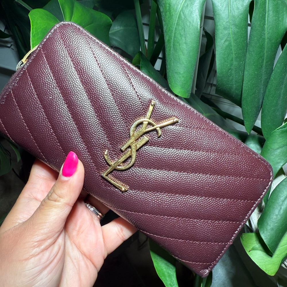 Yves Saint Laurent YSL burgundy leather long zip around wallet Casandra matelass
